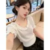 Camiseta de punto de seda helada de manga corta retro francesa de verano para mujer, diseño elegante y único, top que ciñe la cintura y estiliza
