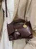 Yuezhi 2026 principios de otoño nueva moda casual bolso pequeño, bolso tipo cubo para debajo del brazo, bolso de hombro y cruzado elegante y versátil