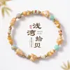 Pulseira de cristal com contas de concha natural e olho de tigre, uma peça única e estilosa para mulheres, com um visual casual e sofisticado, feita com pedras naturais e cristais