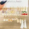 Pendientes europeos y americanos de moda transfronterizos, pendientes exagerados de perlas, pendientes grandes de círculo de cristal, 6 pares de pendientes de borla de mariposa de perlas, para mujer