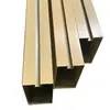 Tubo Cuadrado de Aluminio Techo Madera Grano Aleación de Aluminio Tubo Cuadrado Perfil de Tubo Cuadrado de Aluminio Decoración de Techo de Aluminio Material de División Rejilla Techo