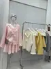 Dulce y elegante conjunto de punto, nuevo modelo otoño/invierno 2026, conjunto de dos piezas de suéter floral tridimensional + falda para mujer