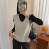 Colete de tricô vintage em camadas com decote V para mulheres, peça externa solta sem mangas para primavera e outono, colete suéter, colete de lã