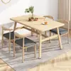 Juego de mesa y sillas nórdicas para uso doméstico, económico para apartamentos pequeños, apto para 4-6 personas, mesa de comedor simple para casa de alquiler comercial