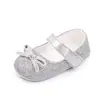 Zapatos de princesa nuevos de primavera y verano con lazo de purpurina suela de goma para niña pequeña zapatos de bebé zapatos de bebé al por mayor total 2572