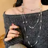 Collar redondo de perlas con cuentas estilo francés, sensación de lujo ligero y alta gama, cadena de suéter de doble capa, accesorio de nicho de diseño único para mujer