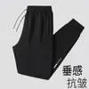 Calça esportiva casual masculina nova e moderna de outono, com bolsos, tamanho grande, calça jogger com zíper, calça de moletom de perna reta