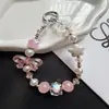 Colgante de cadena para teléfono con lazo de estrella plisado estilo Ins, llavero de alta gama y accesorio para bolso al por mayor