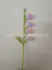 Venta al por mayor de fábrica rama de flor de lirio de cuatro cabezas tejida a mano para decoración de arreglo floral de sala de estar
