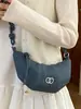 Bolsa feminina de nicho da moda, nova bolsa de ombro popular de moda verão 2026, bolsa de bolinho, bolsa transversal tipo chifre