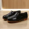 Zapatos de lluvia impermeables de caña baja para hombre, sitio de construcción, protección laboral, zapatos de plástico para lluvia, suela de tendón de res para trabajo, zapatos de goma negra, venta al por mayor