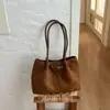 2026 Nuevo Estilo Coreano Moda Nicho Retro Gamuza Bolso Tote Gran Capacidad Viaje Diario Hombro Cruzado