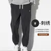 Pantalones casuales con puño, más terciopelo, más gruesos, venta al por mayor de comercio exterior transfronterizo, nuevos pantalones largos holgados de Otoño Invierno 2026 para hombre, pana
