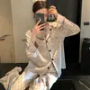 Pijama de seda estilo vitoriano para mulheres, novo modelo primavera e outono 2026, conjunto de roupa de casa de alta qualidade em seda gelada com bolinhas e manga longa