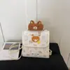 Mochila fofa de urso estilo coreano transfronteiriça para mulheres, adequada para o trajeto diário, pequena mochila de viagem simples