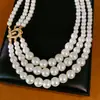 Colar de pérolas com fecho de ferradura de zircônia com contas multicamadas, corrente para clavícula de luxo leve de nicho, joia elegante e estilosa estilo corte para mulheres