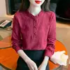 Camisa feminina de algodão e linho jacquard com gola de orelha de madeira Primavera 2026 nova blusa versátil de manga longa justa para usar como base