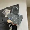 2026 Verano Nuevo Estilo Alta Apariencia Diseño de Lunares Bolso de Mano Bolso de Hombro para el Trabajo Trayecto Diario Casual Bolso Cubo Personalizado de Moda