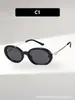 Novos óculos de sol americanos retrô de armação pequena oval com design torcido inspirado na Chanel, oferecendo um visual de luxo leve e elegante, adequados para viagens de carro à beira-mar e uso versátil