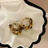 Pendientes de borla con carcasa de madera marrón transfronterizos europeos y americanos, pendientes de estilo vintage Maillard, pendientes de mujer de lujo ligero de alta gama