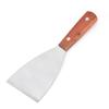 Espátula multiusos disponible en stock para asar, teppanyaki, panqueques y cocinar. Con mango de madera, ideal para carnes y barbacoas.