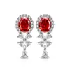 Pendientes de Botón de Flor de Hielo de Colores de Venta Caliente en Tiktok, Huevo de Paloma Dinámico, Trébol de Cuatro Hojas con Diamante de Alto Carbono Brillante, Joyería de Trébol de la Suerte
