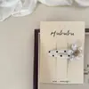 Grampo de cabelo infantil com design de bolinhas onduladas preto e branco e flor de cerejeira, presilha lateral, clip BB