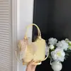 Transfronterizo Verano 2026 Nuevo Modelo Exquisita Moda Versátil Viajero Cotidiano Diseño de Nicho Bolso Cubo de Hombro Cruzado de Gama Alta