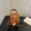 Bolso nuevo casual y a la moda estilo coreano, con un diseño simple y elegante, un bolso de hombro que también se puede llevar cruzado, perfecto para el verano de 2026, un bolso mini cuadrado para mujer