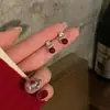 Aretes de Estrella de Circonita Brillante Perla Roja de Año Nuevo para Mujer, Lujo Ligero, Gama Alta, Aretes Únicos y Hermosos, Aretes de Diseño de Nicho