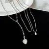 Collar con colgante de corazón redondo tachonado de diamantes, estilo dulce y fresco para mujer, cadena para suéter de diseño nicho, collar elegante y versátil de otoño/invierno