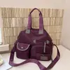 Bolsa feminina transfronteiriça de grande capacidade 2026 Europeia e Americana, bolsa de maternidade, bolsa de ombro em tecido Oxford, bolsa de mão, bolsa de viagem, bolsa transversal