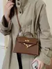 Bolso de mano texturizado con patrón de cocodrilo para mujer, nueva colección 2026, bolso de estilo Kelly, de nicho y lujoso, adecuado para el trabajo y el uso casual, se puede llevar como bolso de hombro o bolso cruzado