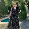 Vestido Longo Saia 2026 Primavera e Outono Novo Estilo Versátil Preto Floral Manga Longa Decote V Cintura Saia Longa