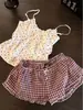 Pijama de tirantes con lazo dulce para niñas, Nuevo estilo Verano 2026 Pantalones cortos a cuadros, Conjunto de ropa para casa estilo deseo puro