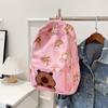 Mochila de Grande Capacidade 2026 Novo Estilo Fashionável e Estilosa Bolsa Escolar para Alunos do Ensino Médio Mochila Casual Infantil e Fofa para Homens e Mulheres