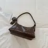 Bolsa de gran capacidad Shuai Mi Jia otoño 2026 nuevo nicho retro bandolera cruzada para clase y desplazamientos bolsa tipo empanadilla