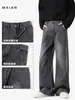 Jeans vintage azul lavado retrô americano com barra curva para homens, calças casuais versáteis de perna larga, soltas, com caimento reto