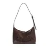 Bolso tipo bandolera coreano de nicho tipo bolsa de dumplings para mujer Otoño 2025 Nuevo Bolso de hombro cruzado simple de alta calidad para el día a día