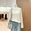 Suéter de punto trenzado hueco para mujer con cuello redondo, nueva colección otoño 2026, estilo holgado y relajado, con un tejido texturizado y afelpado.