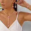 Conjunto de Tres Piezas de Collar, Pulsera y Pendientes de Trébol de Cinco Hojas Transfronterizo Europeo y Americano Collar Espaciador Conjunto de Joyería de Concha de Doble Cara Negra y Blanca