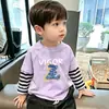 Camiseta de manga larga para niño, nuevo modelo primavera y otoño 2026, top de algodón puro para niños, capa interior para niños mayores, camiseta base de imitación de dos piezas