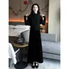 Moda Femenina 2026 Primavera Nuevo Estilo Elegante y de Moda Estilo Francés Falda de Punto de Lana Asimétrica Línea A Conjunto de Dos Piezas