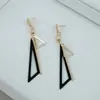 Pendientes Largos de Triángulo Hueco con Borlas de Temperamento Coreano Diseño de Nicho de Moda Pendientes de Celebridad de Internet Venta al por Mayor