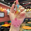 Popular llavero de murciélago de arcilla de doble cara incrustado con diamantes, pequeño colgante de Halloween para niñas, exquisito charm de bolso con cuentas de cristal
