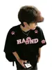 Camiseta de manga corta con bordado de letras flockadas estilo retro americano para hombre, nuevo top juvenil de verano de media manga