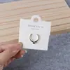 Nueva versión coreana de la tarjeta colgante de embalaje de anillo blanco tarjeta de anillo de cola pequeña anillo de cartón para anillo de goma con cuerda para colgar cabeza de logotipo imprimible