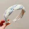 Grampo de Cabelo com Temperamento Fashion Tecido Design de Nicho Faixa de Cabeça para Mulheres Não Apertada Crânio Alto Borda Larga Faixa de Cabelo Atacado