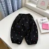 Novas Calças Casuais Quentes com Forro de Lã para Meninas Outono/Inverno Calças de Moletom Coloridas com Estrelas e Punho na Barra para Bebês e Crianças Pequenas Macias Grossas Atacado