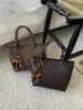 Bolsa Feminina de Nicho Francês Outono e Inverno 2025 Nova Bolsa de Ombro Estilo Retro para o Dia a Dia e Trabalho Bolsa Transversal